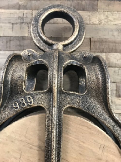 A beautiful pulley, cast iron pully, large