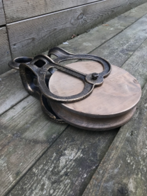 A beautiful pulley, cast iron pully, large