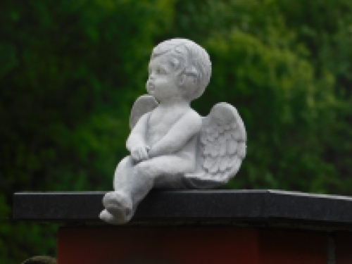 Angel - sitting - full made of stone