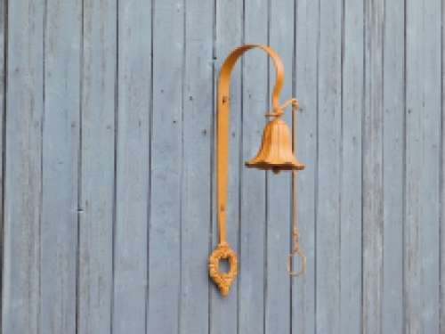 Cast iron wall bell - with wreath - rust colour - retro design