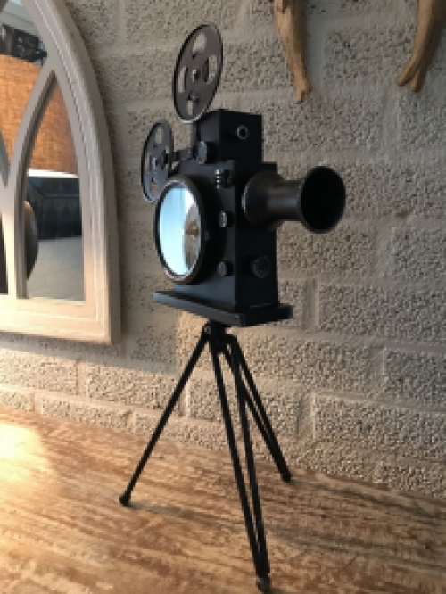 A nostalgic and decorative clock in the shape of an old film camera