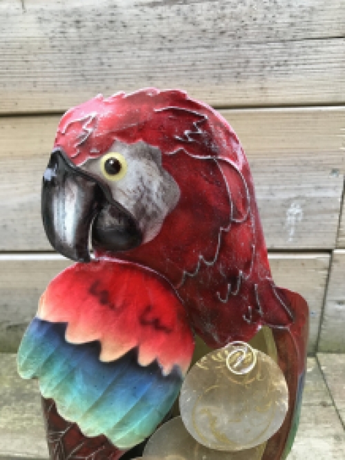 A metal lamp in the shape of a parrot, very beautiful!