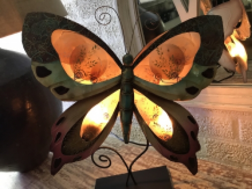 A metal lamp in the shape of a butterfly, very nice!