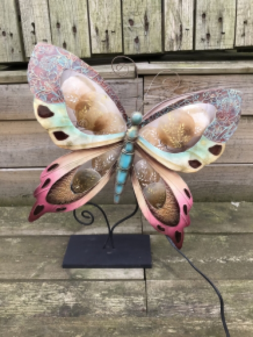 A metal lamp in the shape of a butterfly, very nice!