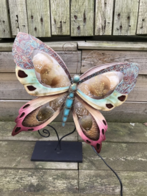 A metal lamp in the shape of a butterfly, very nice!