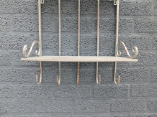 Wrought iron wall rack in antique cream color