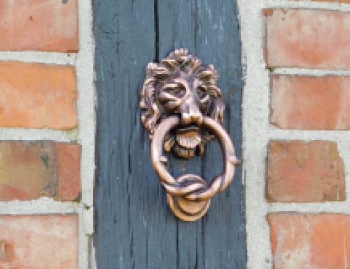 Doorknocker lion, antique iron - copper colour