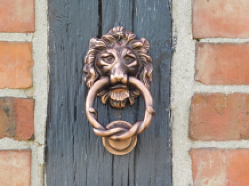 Doorknocker lion, antique iron - copper colour