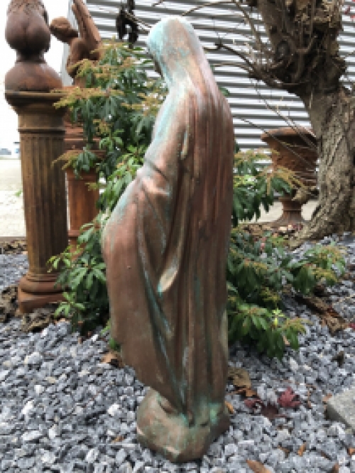 Beautiful statue of Mary with a stone-copper finish