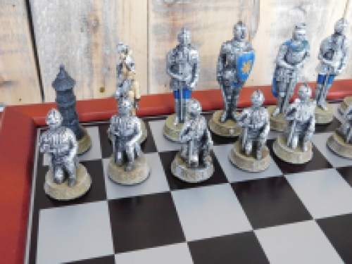 A chess game with the theme: ''MEDIEVAL KNIGHTS'', beautiful chess pieces as medieval knights