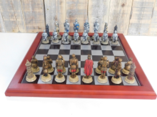 A chess game with the theme: ''MEDIEVAL KNIGHTS'', beautiful chess pieces as medieval knights