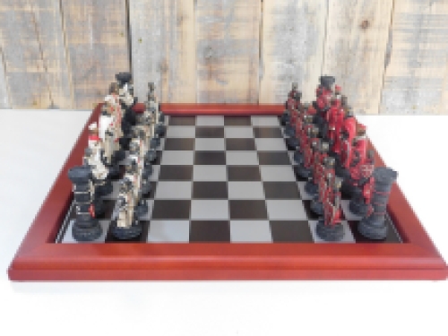 A chess game with the theme: ''MEDIEVAL KNIGHTS'', beautiful chess pieces like medieval knights on a wooden chessboard.