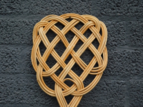 Old-fashioned carpet beater