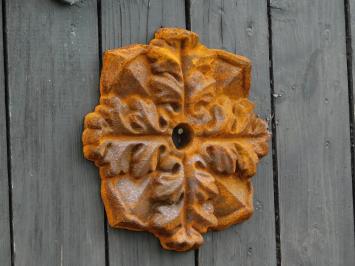 Cast-iron wall anchor in the shape of a leaf