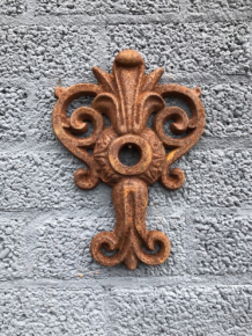 Wall anchor, cast iron, French lily shape.