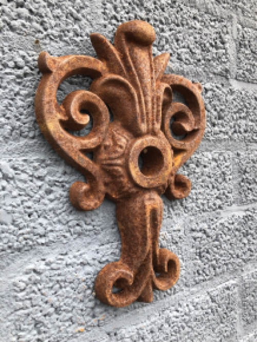 Wall anchor, cast iron, French lily shape.