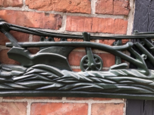 Wanddecoratie XXL , aluminium groen haardplaat boer met paard en ploeg.