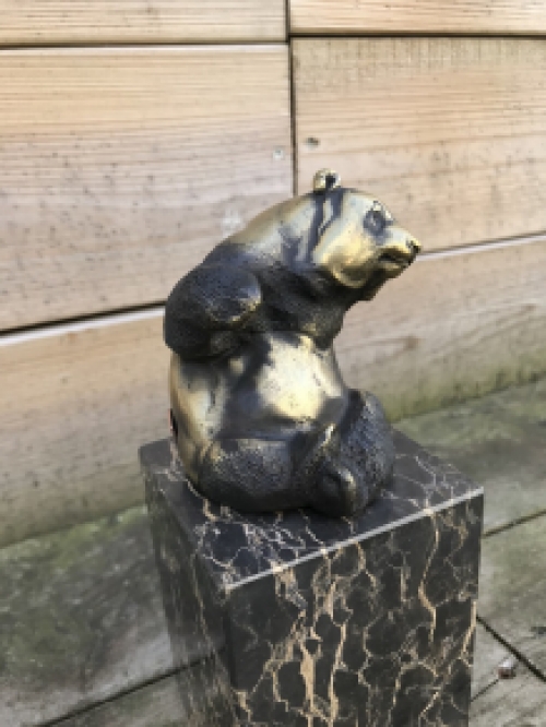 A bronze statue/sculpture of a sitting panda, on a beautiful large base!