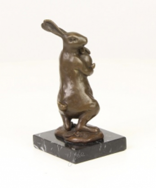 A bronze statue/sculpture of a rabbit with a cub