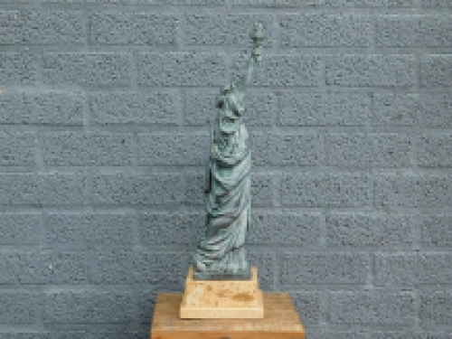 A bronze statue/sculpture of ''THE STATUE OF LIBERTY''