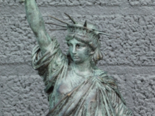 A bronze statue/sculpture of ''THE STATUE OF LIBERTY''