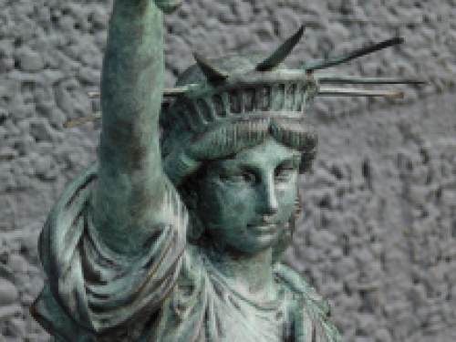 A bronze statue/sculpture of ''THE STATUE OF LIBERTY''