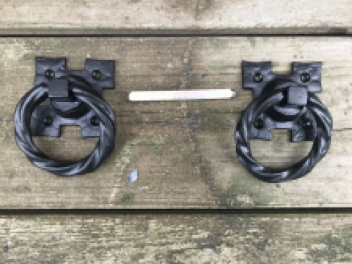 A set of pull handles for the door, for example, cast iron - matt black