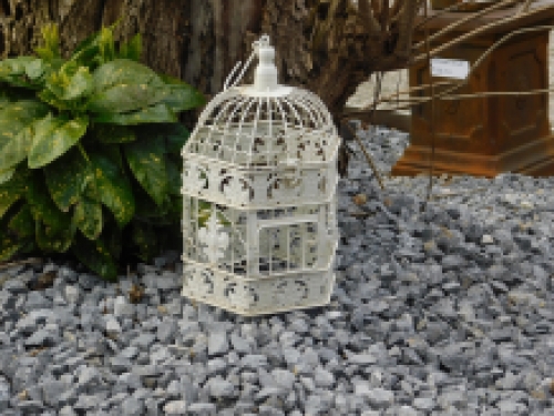 1 small cage for the bird, metal