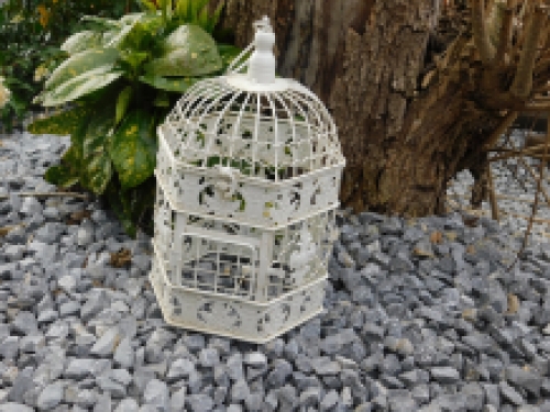 1 small cage for the bird, metal