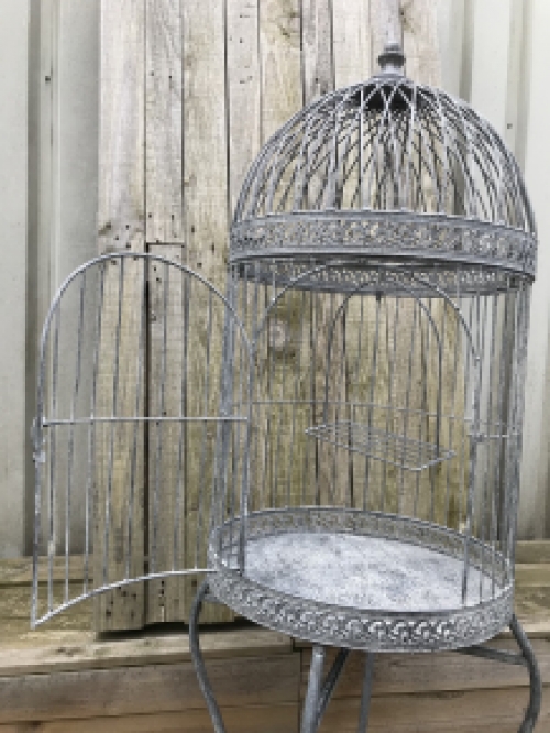 A very pretty decorative birdcage made of iron