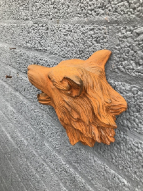 Wolf head, cast iron wall ornament with a rustic surface